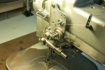 Industrial sewing machine for leather products closeup