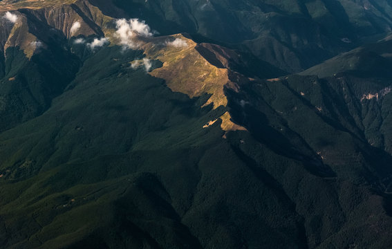 Looking down on mountain tops with just enough light