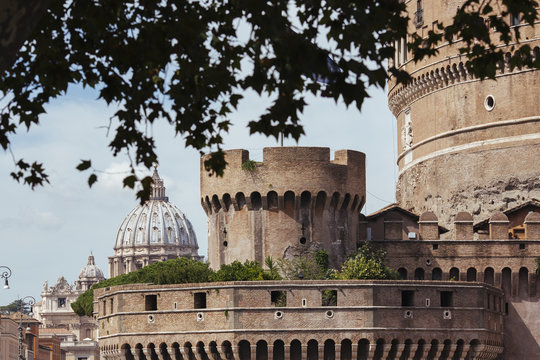 Details of Sant Angelo castle in Rome with Saint Peter?s Basilica in the background