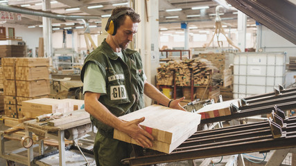 Man Working At The Furniture Factory