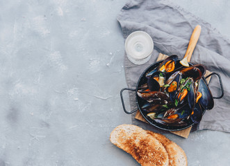 Top view Fresh Steamed sea mussels on stone background