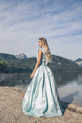 Blond woman posing near Alpsee