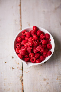 Bowl of Organic Fresh Red Raspberries
