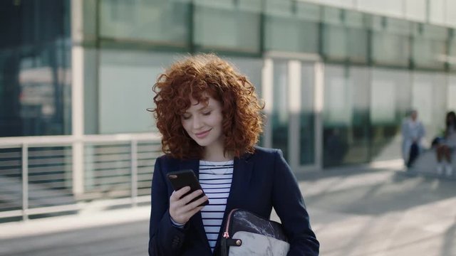 young stylish business woman portrait texting on phone waiting corporate intern 