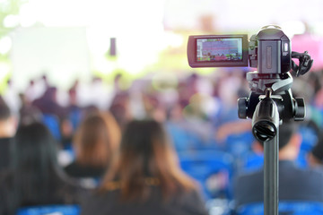 Many people meeting participation and participation in meetings by having a recorded the camcorder .