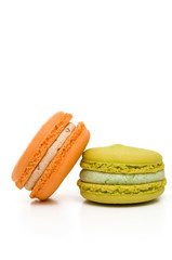 Delicious Isolated Orange and Green Stacked Macarons