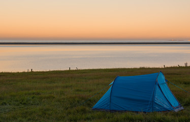 Touristic camp at sunrise in summer ,Iceland.