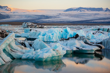 Icebergs in Jokulsarlon glacier lagoon. Vatnajokull National Park, Iceland Summer.Midnight Sun.