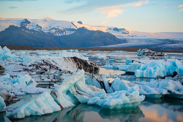 Icebergs in Jokulsarlon glacier lagoon. Vatnajokull National Park, Iceland Summer.Midnight Sun.