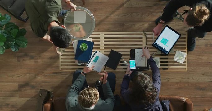 top view diverse professional business people meeting discussing financial research statistics planning innovative market strategy time lapse camera tracking
