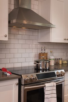 Chimney with induction stove at home