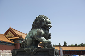Fototapeta na wymiar Chinese guardian lion. Located in The Palace Museum (Forbidden City), Beijing, China