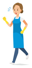A woman wearing a blue apron and rubber gloves is running