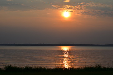 sunset on the reservoir coast