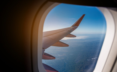 Fototapeta na wymiar view from airplane window to see sky.