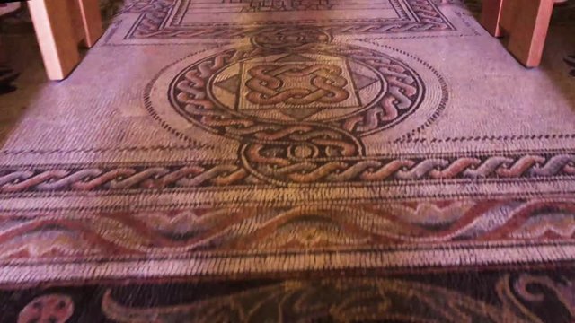 Mosaic tile floor in an ancient church in Israel.