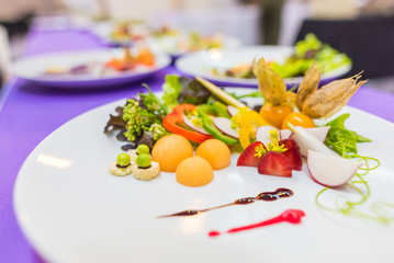 Fresh healthy salad on table.