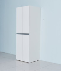 White storage stand with ceramic and dishware in kitchen. modern kitchen furniture. japanese modern Kitchen storage furniture. Dining Room.