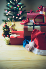 Obraz premium Christmas ornaments on wood table.