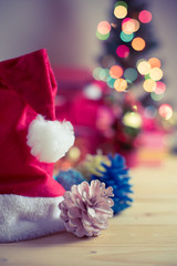 Christmas ornaments on wood table.