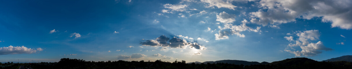   blue sky and mountain in background.