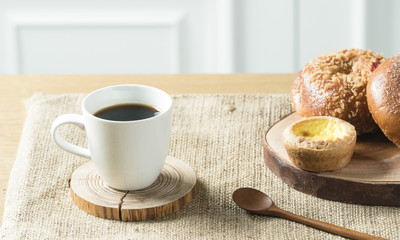 Close up view of bakers are working. Homemade bread. Eating breakfast with bread on the island table in the dining room. Morning coffee.