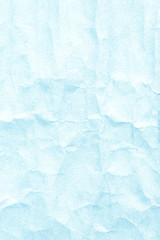 Crumpled light blue paper texture