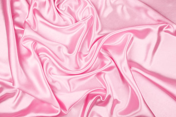 Pink luxury satin fabric texture for background