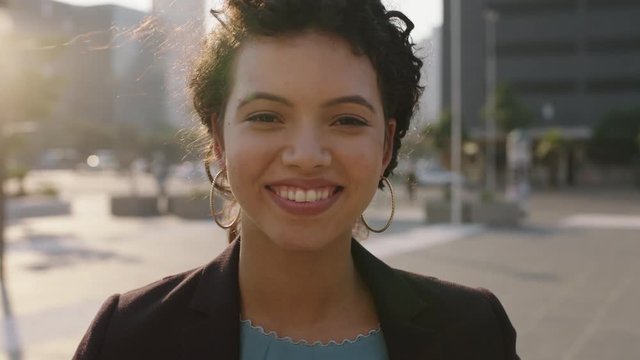 portrait of happy young woman business intern student laughing cheerful at camera enjoying lifestyle