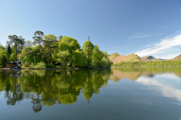 Fototapeta premium Reflections in Derwentwater from ferry from Keswick