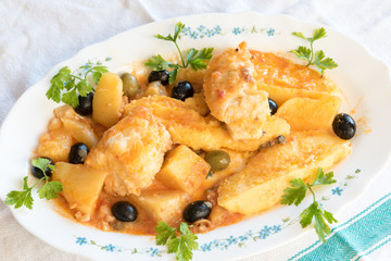 Cod with tomatoes and polenta