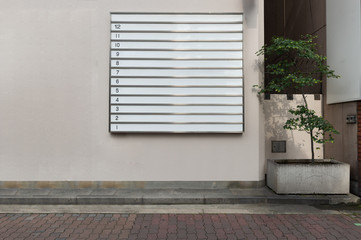 Large blank billboard on a street wall, banners with room to add your own text