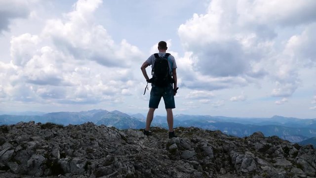 Man on the edge of mountine