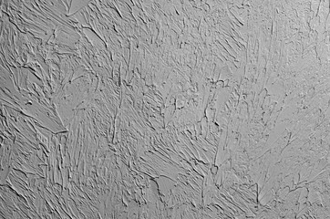 Wallpaper texture of frozen clay on the wall. Black and white background