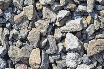 Stone rubble in the construction of the road for vehicles. Textured background
