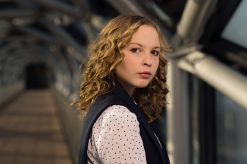 girl stands in the corridor 