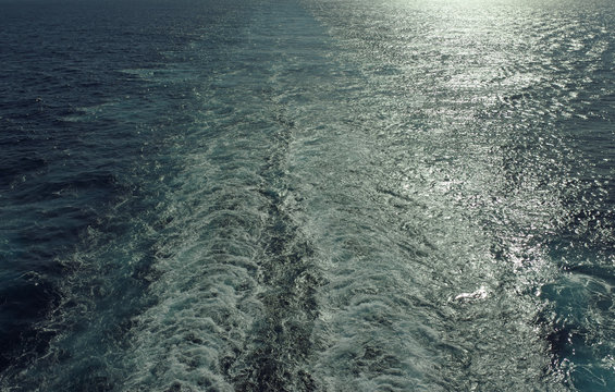 Wake of a cruise ship against the light