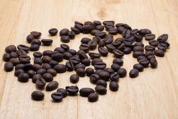Coffee bean objects on wood table