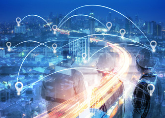 double exposure of network and city  and network connection concept.Internet data connection.Engineer planing for construction internet connection.