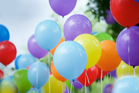 Balloons of different colors filled with helium