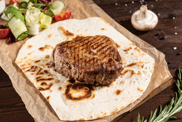 grilled steak with sauce