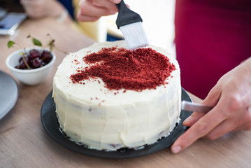 chef making red velvet cake