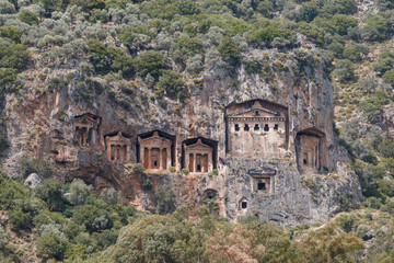 Fototapeta premium Ancient rock-cut tombs near Kaunos ruins, Turkey