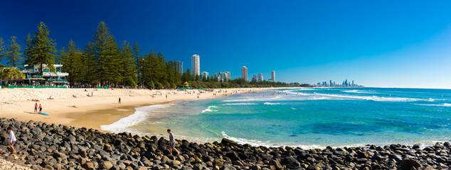 GOLD COAST, AUS - JULY 8 2018: Gold Coast skyline and surfing beach at Burleigh Heads, Australia