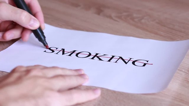 Stricking through "Smoking" inscription