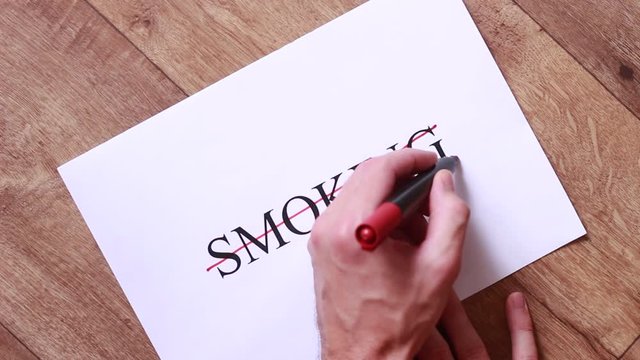 "Smoking" inscription stricked through with red marker