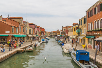 Naklejka na ściany i meble Burano, Italy - Burano is a small island and, with its colorful buildings, one of the treasures of Venice Lagoon