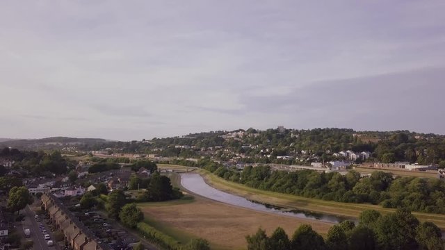 Beautiful aerial view of a local residential area in Exeter, Devon. With a river flowing through the town.