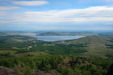 Panoramic view of Bannoe Lake from top of Kryktytau Range, South Ural, Russia