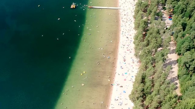 Flying Over Crowed Beach in Summer in Finland